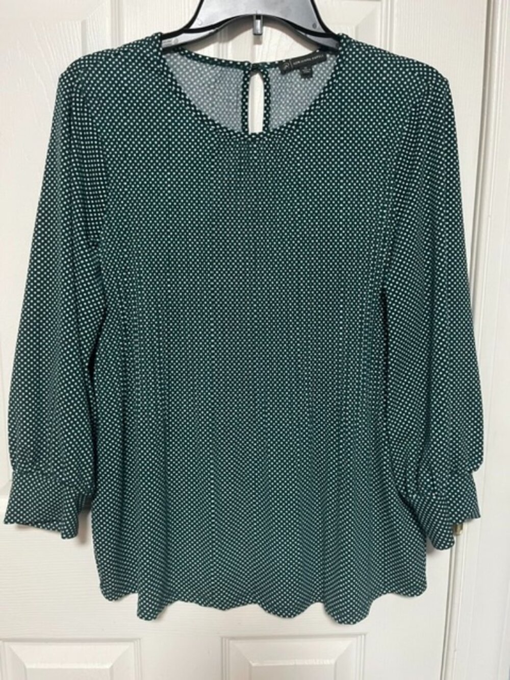 Woman's Green Polka dotted Pleated Blouse